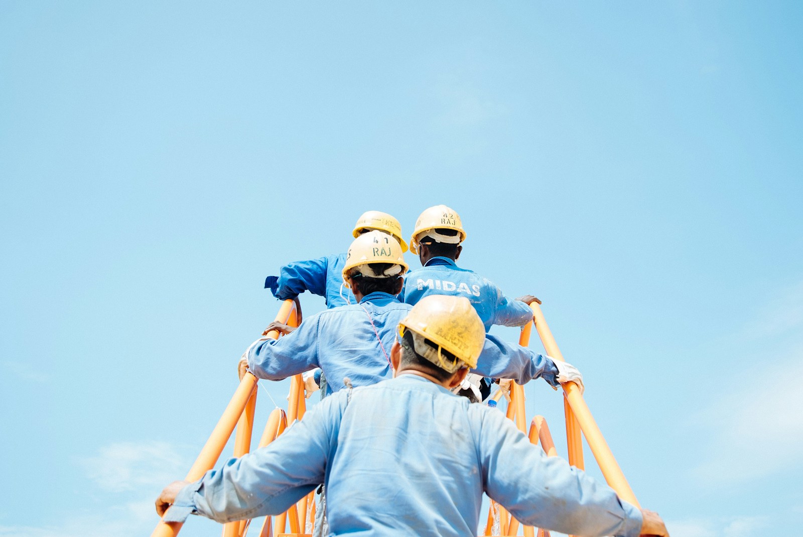 group of person on stairs with workers' compensation insurance